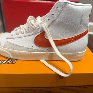 Nike High-Top Sneakers in White and Orange Blazers. Women’s 9 / Men’s 7.5 .